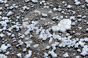 Crystals of self-precipitating common salt (sodium chloride) crystallized at the bottom