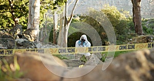 Csi, photographer and evidence at crime scene for investigation in forest with police tape and safety hazmat. Forensic