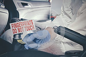 CSI - searching and developing of fingerprints on place of murder in car