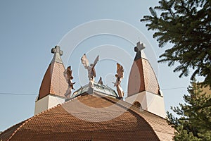 Archangels and crosses on Makovecz church Miercurea Ciuc