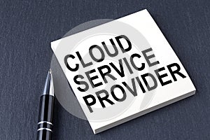 CSP Cloud Service Provider text on the sticker with pen on the black background photo