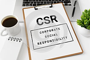 CSR Corporate Social Responsibility on white paper.