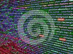 Css3 code on a colorful background. Programmer working in a software develop company office. Programming code abstract screen of