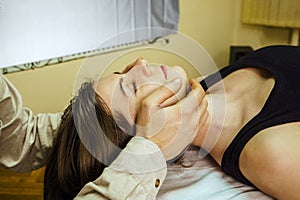 a CST treatment session for a woman, Osteopathic Manipulation and CranioSacral Therapy 20 photo