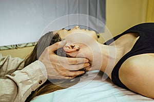 a CST treatment session for a woman, Osteopathic Manipulation and CranioSacral Therapy 22 photo