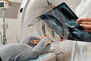 CT scan of abdomen of man in medical clinic. Man is doing computed tomography x-ray scan chest examination of abdominal