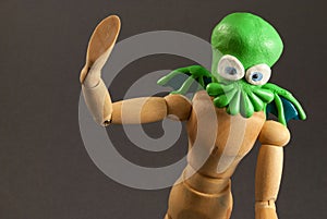 Cthulhu wooden dummy.