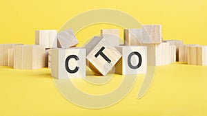 CTO, Chief, Technology, Officer symbol. wooden blocks with words CTO concept