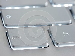 Ctrl - Control key on silver laptop keyboard