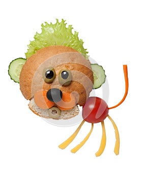 Cub made of bread and vegetables on white background