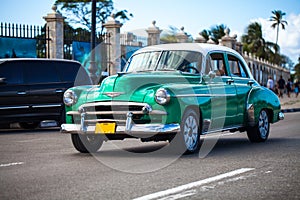 Cuba american Oldtimer drive on the street