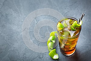 Cuba libre alcohol cocktail drink with rum, cola, ice, lime