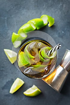 Cuba libre alcohol cocktail drink with rum, cola, ice, lime