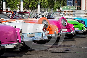 Cuba many american colourful classic cars parked in the city from Havana