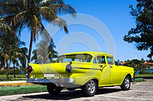 Cuba yellow classic cars in havana