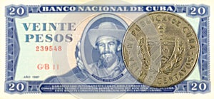 20 cuban centavo coin against 20 cuban peso banknote photo
