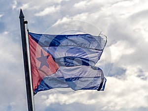 Cuban flag on cloudy sky