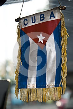 Cuban flag hanging in car. for a free cuba. cuba libre. island of freedom. cuban revolution