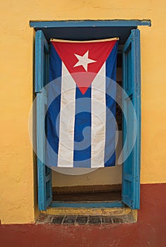 Cuban flag at window