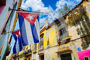 Cuban flags and decaying buildings in Old Havana