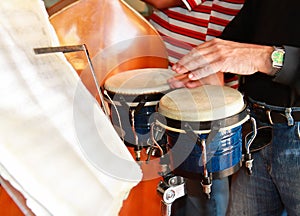 Cuban musician playing pongo drum