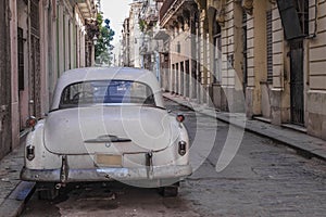 Cuban old car parked photo