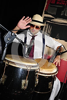 Cuban percussionist on black