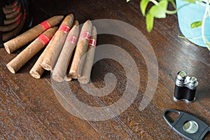 Cuban pyramid cigars on table