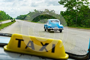 Cuban taxi. Taxi on Cuba. Higway drive