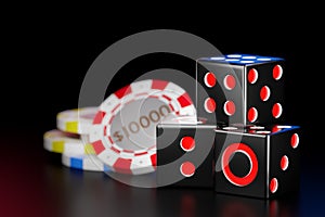 Cube black dice stack in the dark background. Casino chips are used to represent money in the gambling craps game.