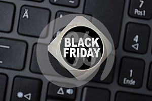 Cube, block or dice with message Black Week and Black Friday on laptop keyboard