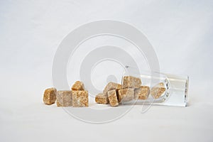 Cube brown sugar with glass