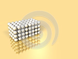 A cube made up of metallic balls. It represents a strong bond.