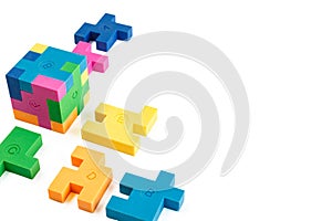 Cube puzzle of multi-colored rubber shapes. Concept of decision making process, creative, logical thinking. Logical tasks