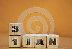 Cube shape calendar for January 31 on wooden surface with empty space for text, new year Wooden calendar with date, January cube