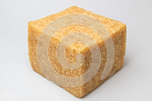 Cube synthetic rubber sample on a white background photo