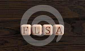 Cube wooden block flsa font symbol Fair Labor Standards Act united state of america usa business labor employee work job
