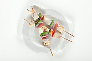 Cubed chicken kabobs plate