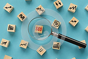 Cubes with the acronym SEO for search engine optimization concept.