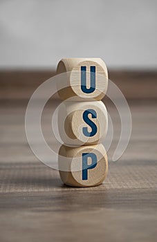 Cubes and dice with acronym USP unique selling proposition or unique selling point photo