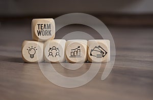 Cubes dice with employees and teamwork