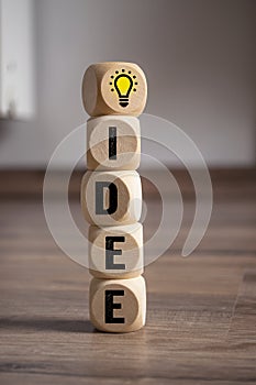 Cubes dice with inspiration concept light bulb metaphor for good idea