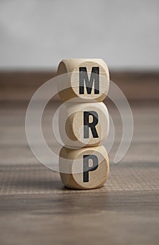 Cubes and dice with MRP Material Requirement Planning photo