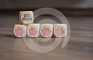 Cubes dice with piggy banks and save money photo