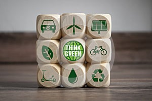 Cubes and dice with think green and save our planet with green electricity