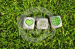 Cubes and dice with think green and save our planet with green electricity