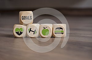 Cubes dice with your goals, health care, fitness training, nutrition and sleep