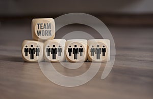 Cubes with employees and teamwork