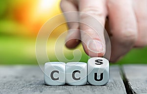 Cubes form the expression CCU and CCS