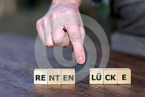 Cubes form the German expression \'Rentenluecke\' (pension gap).